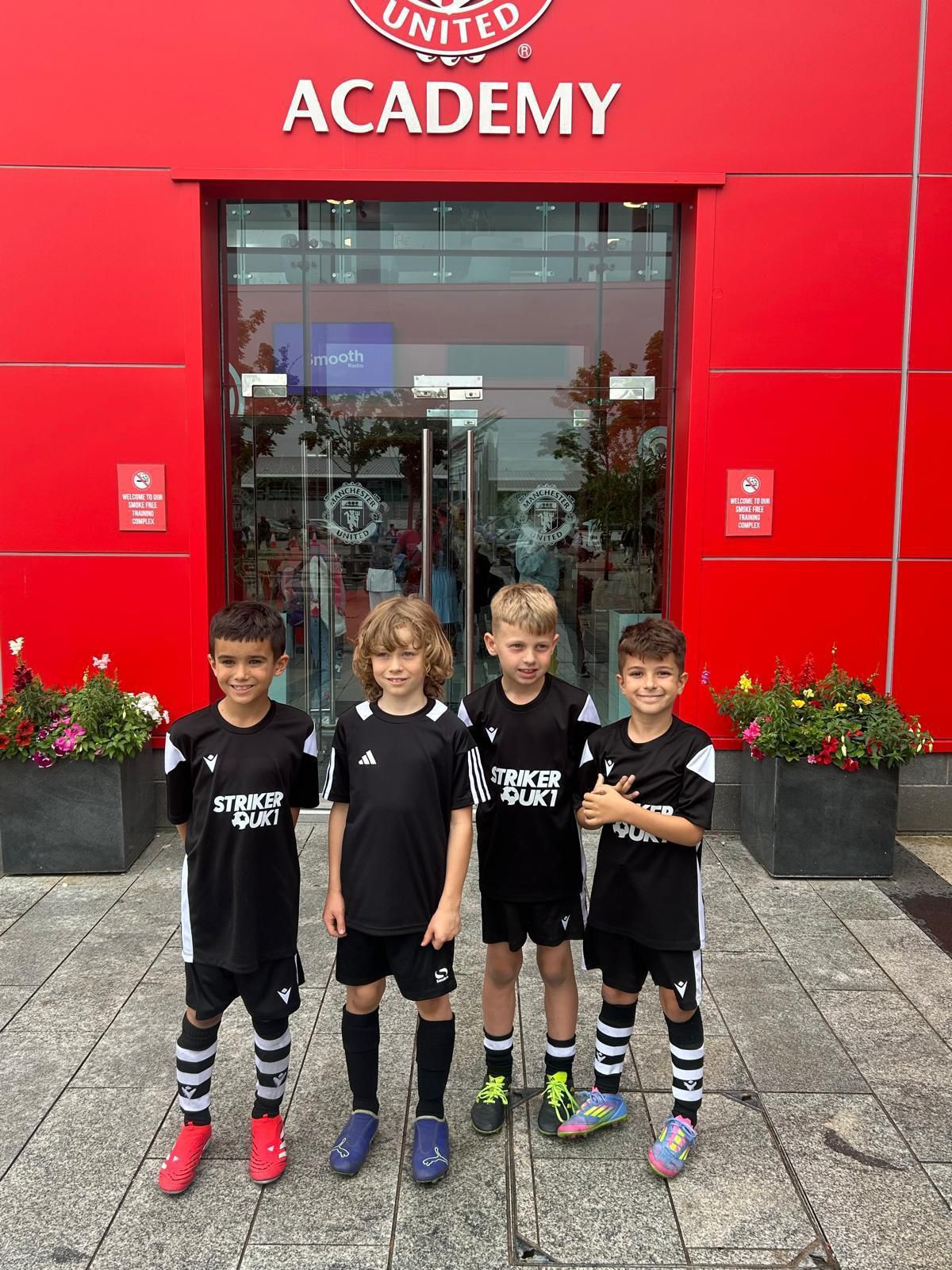 Youth football training session at StrikerUK1 indoor facility in Barnsley led by professional coach Zak Dearnley